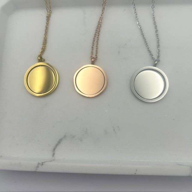 Rotating Pendant necklace, available in gold, rose gold and silver stainless steel
